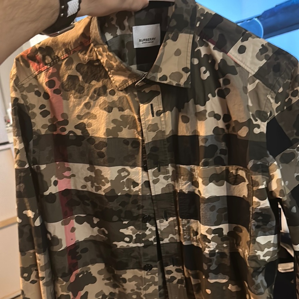Used twice Burberry shirt really nice great shirt no longer fits